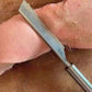 Gris Hårskrapa