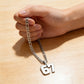 Halsband med nummerpendant 67